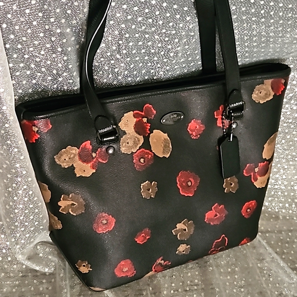 Black and red  flowers Coach bag and matching wallet.  Almost new.